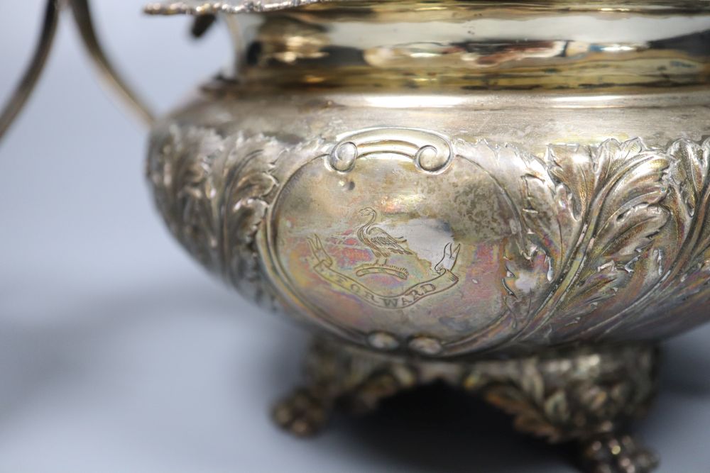 A George IV embossed silver lidded sugar bowl and matching cream jug, Joseph Angell I, London, 1823, 34.5oz.